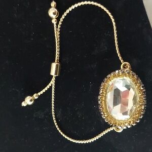 Oval clear glass faceted crystal sliding goldtone statement bracelet